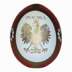 These beautiful wooden eggs are hand painted on one side and feature an applique of the Polish eagle on the other side.
The back side designs vary in colors and patterns.
