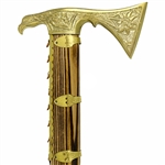 The ciupaga is the Polish mountaineer's combination mountain axe and walking stick. This model has a beautiful solid brass head. Made in Zakopane the main body has a stripe pattern Sometimes vertical and sometimes horizontal) in the wood grain.