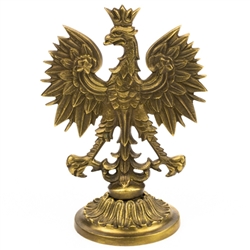 Make a statement with this beautiful heavy brass Polish eagle, mounted on a brass pedestal. For placement on a desk, shelf, curio cabinet, or other display area. Eagle is visible on either side.  Size is approx 6" x 4".