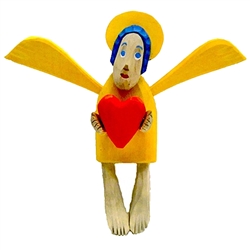 Hand carved painted folk angel by carver Maciej Manowiecki.  The artist is known for his unique, whimsical style.  His work can be characterized by the use of unconfined form, vibrant color, and lightness of style which brings each piece to life.