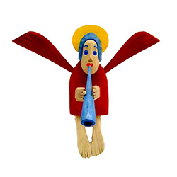 Carved and painted folk angel by folk artist Maciej Manowiecki. The artist is known for his unique, whimsical style. His work can be characterized by the use of unconfined form, vibrant color, and lightness of style which brings each piece to life.