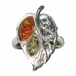 Honey and Green Amber stones set into a sterling silver leaf.