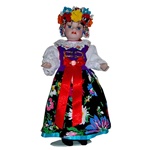 With porcelain head, arms & legs, and hand made authentic Slask (Silesian) dress, this is a beautiful doll! Please note that dress materials are unique and vary from doll to doll so no two are exactly alike. Stand included.
