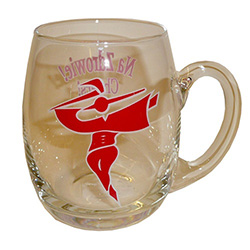 Lively-looking Polish Goral (mountain man) dancer emblazoned on one side of this glass beer mug, and the words "Na Zdrowie! - Cheers!" on the opposite side.