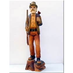 This is a very tall (18") hand carved and stained figure of a forest huntsman carry his shotgun.  Very nicely detailed.
Shotgun is separate and fits into the hunter's hand.