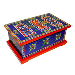 These beautiful hand painted boxes are replicas of larger chests that were used to store pillows. blankets, clothes etc. in the homes of villagers from the Krakow region.   This chest is a piggy bank with a slot in the top.