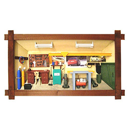 Poland has a long history of craftsmen working with wood in southern Poland. Their workshops produce beautiful hand made boxes, plates and carvings.  This shadow box is a look inside a traditional Polish vehicle repair shop.  Note the nice attention to de