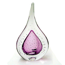 Two-sided art glass paperweight, with a gorgeous violet interior core, surrounded by flurry of bubbles, in a classic teardrop shape.  Each piece is hand blown and hand finished in Poland.  Made with the highest quality craftsmanship and hand-signed by the