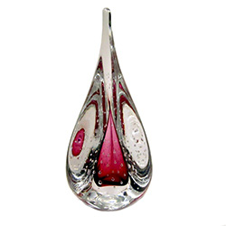 Three-sided art glass paperweight, with a gorgeous cranberry interior core, surrounded by a flurry of bubbles, in a classic teardrop shape.  Each piece is hand blown and hand finished in Poland.  Made with the highest quality craftsmanship and hand-signed