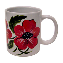 Beautiful hand painted red poppies on this white ceramic mug. No two alike.  Hand wash only.