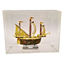 Hand made replica of an 18th century sailing ship made from amber.  Mounted in a plexiglass display case.   Exquisite hand craftsmanship.  Unique and very beautiful.
