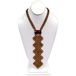 Gorgeous woven cherry and honey amber necklace/necktie.  Tie length is 8" (20cm).  All small beads are faceted.