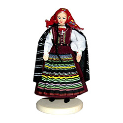 This traditional Polish Radomianka doll is completely hand made the old fashioned way with papier mache, dress materials and paints.
These dolls are perfect, clothed in authentic regional folk costumes, as certified by the Polish Ministry of Culture. The