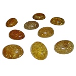 Approx .5" x .75" x .25: thick - 15mm x 20mm x 7mm thick.  These oval domed amber cabochons are quite sparkly.  Price is per piece.