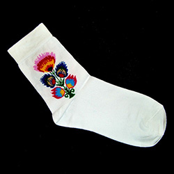 Folk is in fashion and these beautiful Polish hosiery featuring a Lowicz wycinanka floral design look really sharp.  Made in Lowicz, Poland.