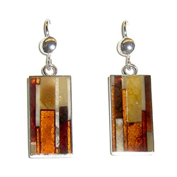 Beautiful set of dangle earrings, consisting of a mosaic of amber stones set in silver with a French hook attachment.  No two are exactly alike.