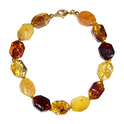 Nicely faceted amber stones on a knotted cord.