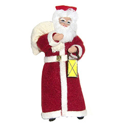 From the workshops of the Cepelia cooperative in Krakow comes this traditional St Nicholas carrying his lantern.  This is a hanger doll designed to be displayed on a tree or from an ornament holder.  Completely hand made using traditional materials includ