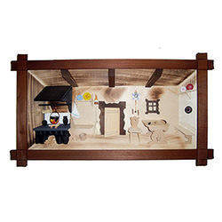 Poland has a long history of craftsmen working with wood in southern Poland. Their workshops produce beautiful hand made boxes, plates and carvings.  This shadow box is a look inside a traditional Polish farmer's cottage. Note the nice attention to detail