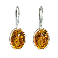 Open back oval amber earrings set in silver really highlight the amber inclusions.