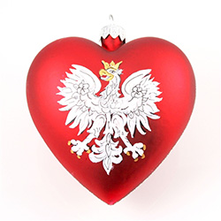 Blown red glass heart featuring the Polish Eagle on one side and Polska (Poland) on the other.  Trimmed around the edge in gold glitter paint this is a very pretty ornament that can be hung on a tree or by itself on a stand. Made in Poland.