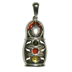 This is a pretty sterling silver matrushka doll highlighted with amber.