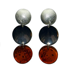 An artistic setting of amber and silver discs.  Silver posts