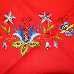 One of the most important highlights of Kashubian art is embroidery. Very subtle and delicate, adapted to the size of the canvas and frequently arranged in the shape of a triangle. Traditional Kashubian embroidery is famous for its wide range of motifs.