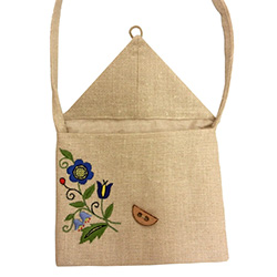 Handmade linen purse with an extra long shoulder strap embroidered with a traditional Kashubian floral design.