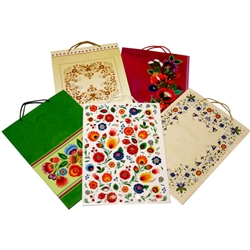 Delightful Polish folk themed paper gift bags are the perfect way to present those special gifts.  Glossy color paper with cloth handles, cardboard bottom insert for added strength and all made in Poland.  Set of 5 different patterns.