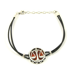 Sterling Silver and Baltic amber Libra zodiac sign charm on a durable cord made of black rubber.