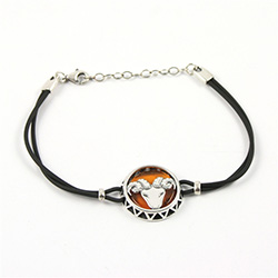 Sterling Silver and Baltic amber Aries zodiac sign charm on a durable cord made of black rubber.