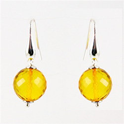 Multi faceted clear honey amber earrings set in sterling silver.  Stylish and unique.