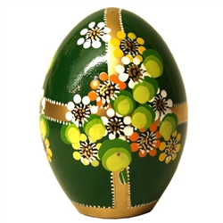 These beautiful goose size wooden eggs have a flat bottom so no stand is required.  The background color is green and the floral designs are different.  No two eggs are alike.
