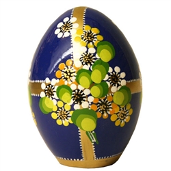 These beautiful goose size wooden eggs have a flat bottom so no stand is required.  The background color is dark blue and the floral designs are different.  No two eggs are alike.