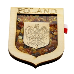 Hand made of wood and filled with amber this very attractive magnet features the Polish Eagle. the national emblem of Poland.  Attached on the right side are the colors of the Polish flag.