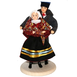 This traditional Sandomierz couple is completely hand made the old fashioned way with papier mache, dress materials and paints.  The doll is clothed in authentic regional folk costume as certified by the Polish Ministry of Culture.  Notice the attention t