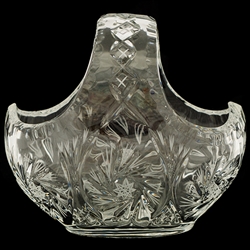 Genuine hand cut lead crystal basket with the traditional starburst cut design.  These come from the town of Zawiercie in southeastern Poland famous for their glass and crystal works.  These crystal baskets are uniquely Polish with intricate designs cut i