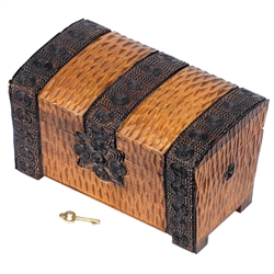 Chest comes with a built in lock (key provided)., hand carved decoration, curved lid.Lock and key, hand carved decoration, curved lid.