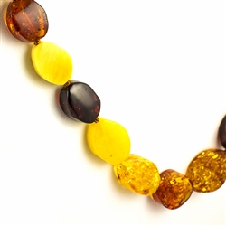 The beads on this beautiful necklace are a unique shape and knotted between each bead.