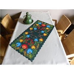 Die cut with scalloped edging and plasticized on top this gorgeous cloth place mat features a beautiful example of a Polish paper cut (wycinanka)