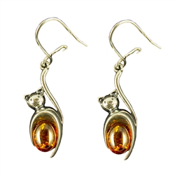 You can tell these are happy little cats by their curled tails!  Set with two pieces of cognac colored amber.