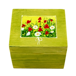 Hand painted duck egg featuring a field of flowers and nested inside a hand stained and painted wooden box with a matching forest scene. The duck egg is blown out and comes with a ribbon hanger. Magnetized lid. Hand made so no two eggs or boxes are exactl