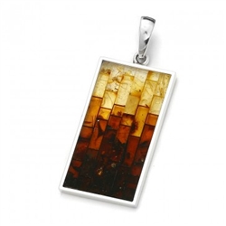 Stunning pendant with multi-color mosaic amber. The process to create this amber mosaic is quite unique. See the video below.