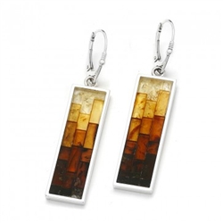 Stunning earrings with multi-color mosaic amber. The process to create this amber mosaic is quite unique. See the video below.