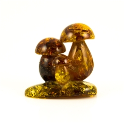 We are aware of only one artist in Poland making these delightful mushrooms from amber. Naturally shaped with pure raw baltic amber.