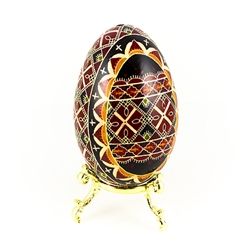 This beautifully designed and executed turkey egg is hand painted by our artist from Canada using the traditional batik method. The egg has been emptied through two small holes at each end of the egg. Stand sold separately.