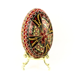 This beautifully designed and executed goose egg is hand painted by our artist from Canada using the traditional batik method. The egg has been emptied through two small holes at each end of the egg.