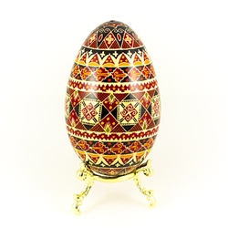 This beautifully designed and executed turkey egg is hand painted by our artist from Canada using the traditional batik method. The egg has been emptied through two small holes at each end of the egg. Stand sold separately.