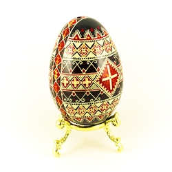 This beautifully designed and executed turkey egg is hand painted by our artist from Canada using the traditional batik method. The egg has been emptied through two small holes at each end of the egg. Stand sold separately.